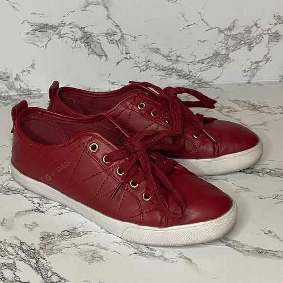 red guess trainers